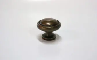 knop brons reliëf