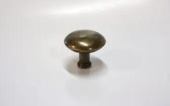 knop oud messing