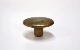 knop ovaal oud messing